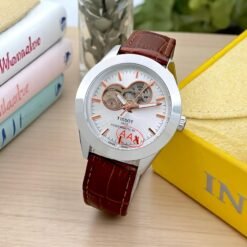 TISSOT WHITE DIAL SILVER OUTER RING BROWN STRAP